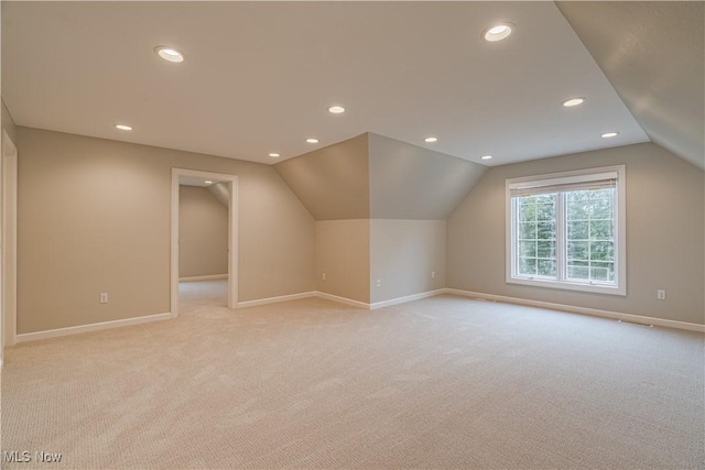 3925 Waterford Ct, Orange, OH 44122 - additional living space featuring light carpet, recessed lighting, and vaulted ceiling