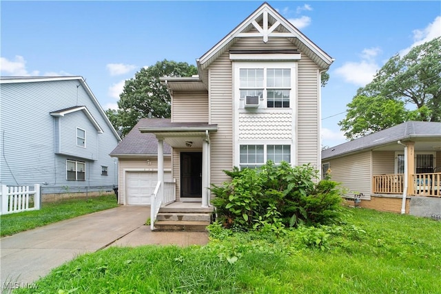 630 E 103rd St, Cleveland, OH 44108 - view of front of home featuring an attached garage and driveway