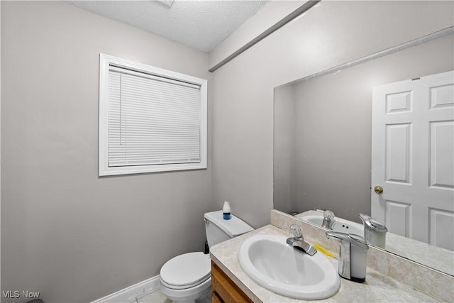 630 E 103rd St, Cleveland, OH 44108 - bathroom featuring vanity and a textured ceiling