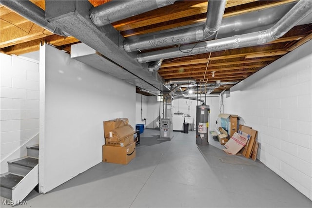630 E 103rd St, Cleveland, OH 44108 - unfinished basement featuring water heater and concrete block wall