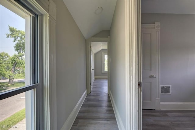 18104 Garden Blvd, Warrensville Heights, OH 44128 - hallway featuring wood finished floors and vaulted ceiling