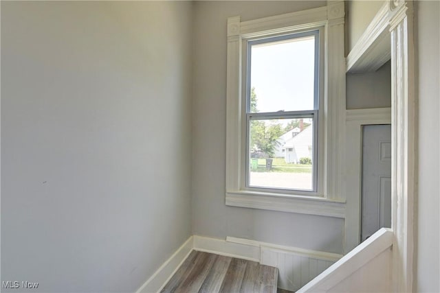 18104 Garden Blvd, Warrensville Heights, OH 44128 - detailed view of baseboards and wood finished floors
