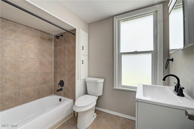 18104 Garden Blvd, Warrensville Heights, OH 44128 - full bathroom featuring vanity, shower / bath combination, and tile patterned floors