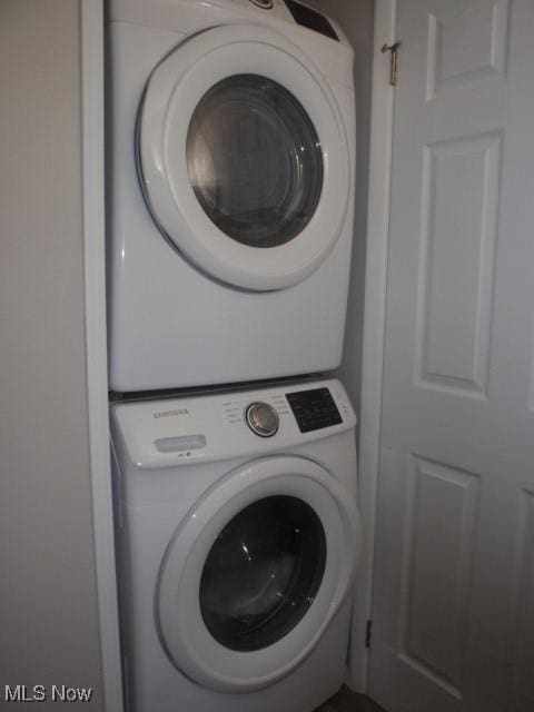 23 Valley Forge Ln, Elyria, OH 44035 - laundry area featuring stacked washing machine and dryer
