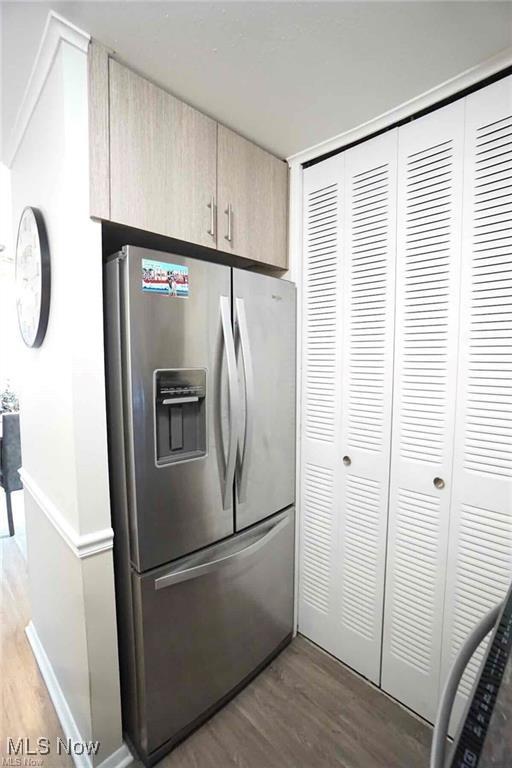 23 Valley Forge Ln, Elyria, OH 44035 - kitchen with stainless steel fridge and wood finished floors