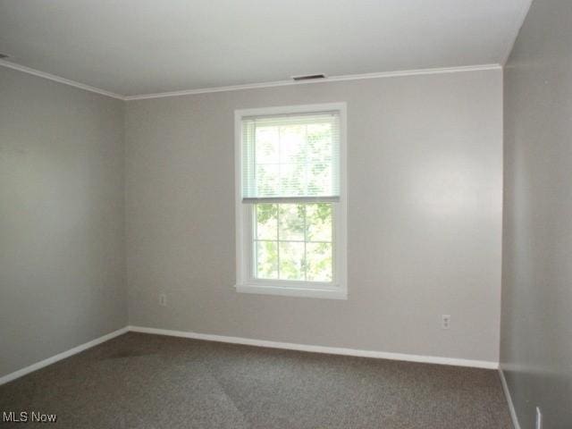 23 Valley Forge Ln, Elyria, OH 44035 - unfurnished room featuring ornamental molding, plenty of natural light, and carpet