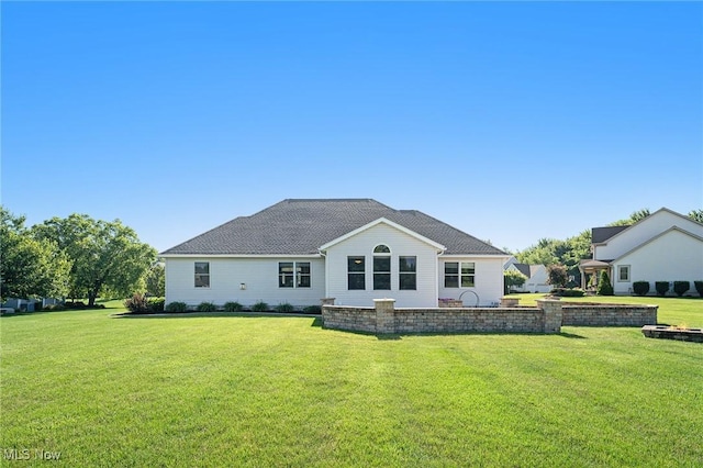 6782 Fawndale Dr, Medina, OH 44256 - rear view of property featuring a yard