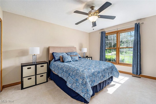 6782 Fawndale Dr, Medina, OH 44256 - carpeted bedroom with baseboards and a ceiling fan