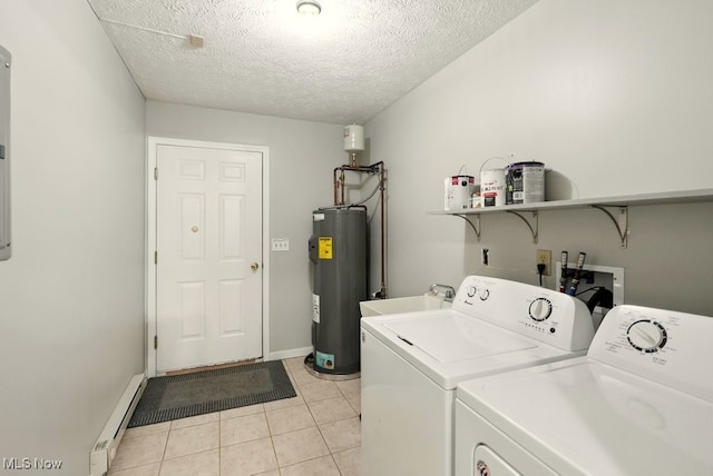 232 Damon Dr, Munroe Falls, OH 44262 - washroom with electric water heater, washing machine and clothes dryer, light tile patterned floors, and a textured ceiling