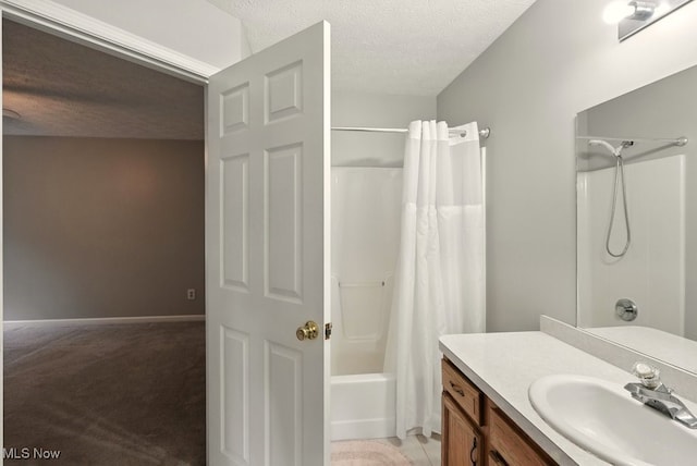 232 Damon Dr, Munroe Falls, OH 44262 - bathroom with vanity, shower / bath combination with curtain, and a textured ceiling
