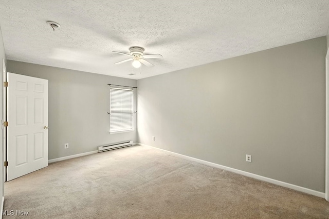 232 Damon Dr, Munroe Falls, OH 44262 - empty room with a baseboard heating unit, carpet, a ceiling fan, a textured ceiling, and fire sprinkler in ceiling