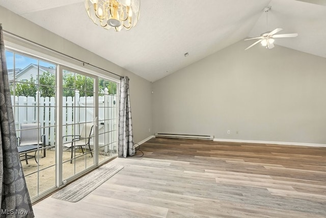 232 Damon Dr, Munroe Falls, OH 44262 - empty room with a baseboard heating unit, a chandelier, wood finished floors, a ceiling fan, and high vaulted ceiling