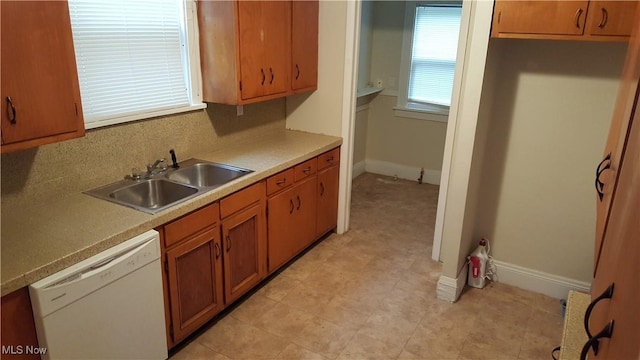 13558 Cedar Rd, University Heights, OH 44118 - kitchen featuring dishwasher, brown cabinetry, and light countertops