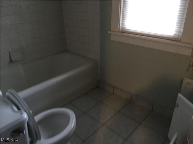 265 E 191st St, Euclid, OH 44119 - bathroom featuring tile patterned flooring and tub / shower combination