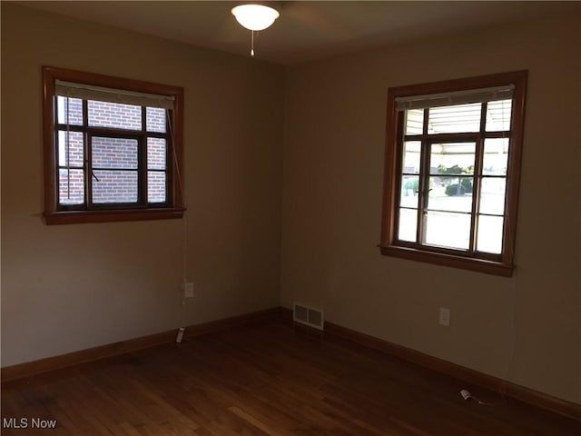 5785 Fitch Rd, North Olmsted, OH 44070 - unfurnished room with wood finished floors and healthy amount of natural light