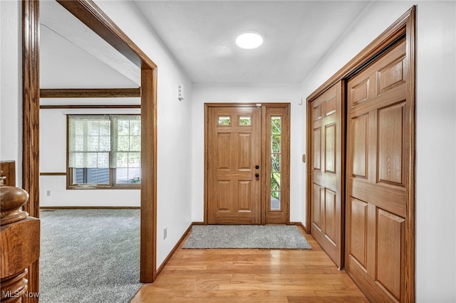 3578 County Line Rd, Madison, OH 44057 - foyer featuring healthy amount of natural light and light wood finished floors