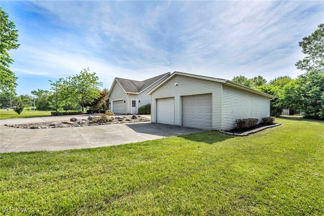 3578 County Line Rd, Madison, OH 44057 - view of side of home with a lawn and an attached garage