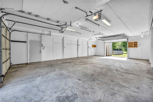 3578 County Line Rd, Madison, OH 44057 - garage with a garage door opener