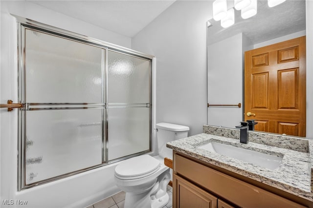 3578 County Line Rd, Madison, OH 44057 - bathroom featuring vanity, bath / shower combo with glass door, and tile patterned floors