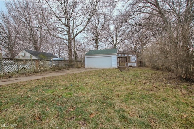 4607 Lincoln Ave, Parma, OH 44134 - view of yard featuring an outdoor structure, concrete driveway, and a garage
