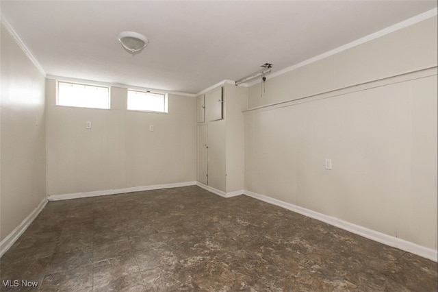 4607 Lincoln Ave, Parma, OH 44134 - below grade area featuring baseboards and crown molding