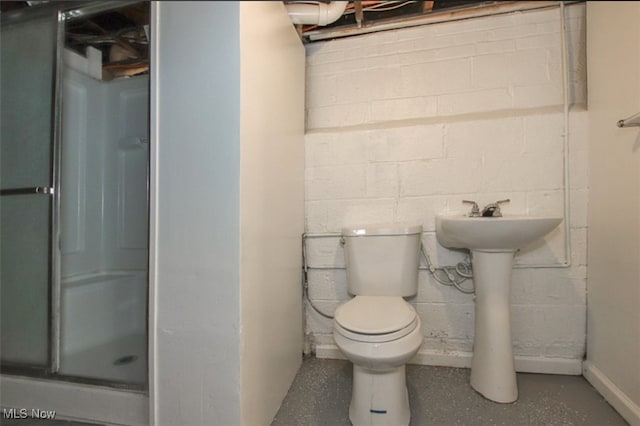 4607 Lincoln Ave, Parma, OH 44134 - bathroom featuring a shower stall and concrete block wall