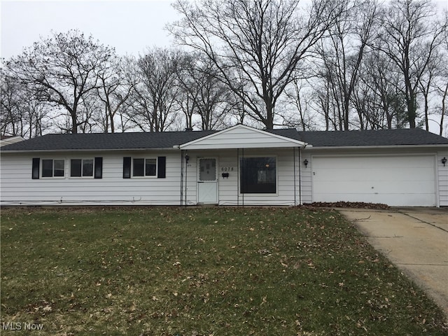 6078 Randolph Rd, Bedford Heights, OH 44146 - ranch-style house featuring driveway, an attached garage, and a front lawn
