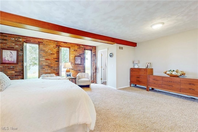 6803 County Road 22a, Bloomingdale, OH 43910 - bedroom with carpet flooring, beamed ceiling, and brick wall
