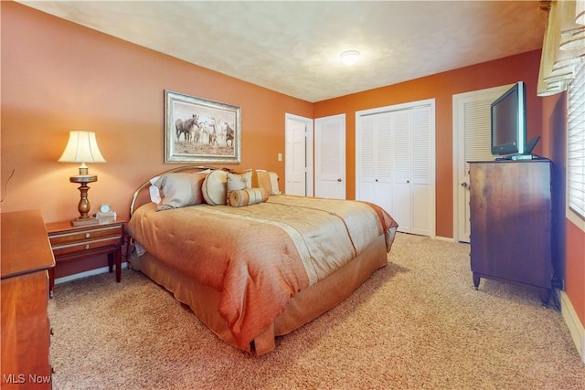 6803 County Road 22a, Bloomingdale, OH 43910 - bedroom with light carpet and multiple closets
