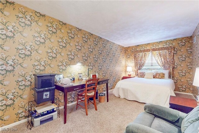 6803 County Road 22a, Bloomingdale, OH 43910 - bedroom with wallpapered walls, carpet flooring, and a desk