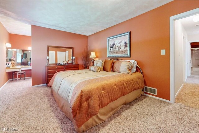 6803 County Road 22a, Bloomingdale, OH 43910 - carpeted bedroom featuring connected bathroom