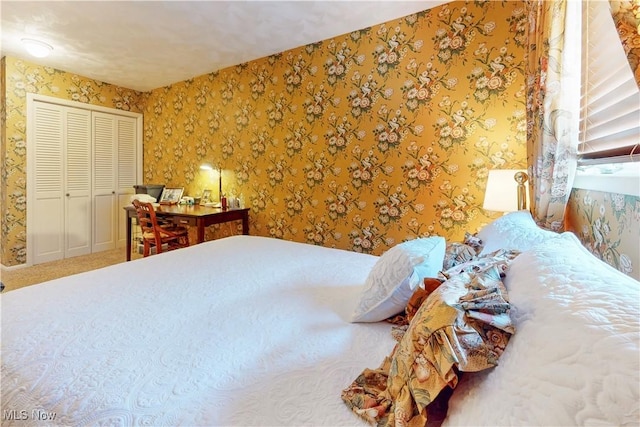 6803 County Road 22a, Bloomingdale, OH 43910 - bedroom featuring wallpapered walls, a closet, and carpet
