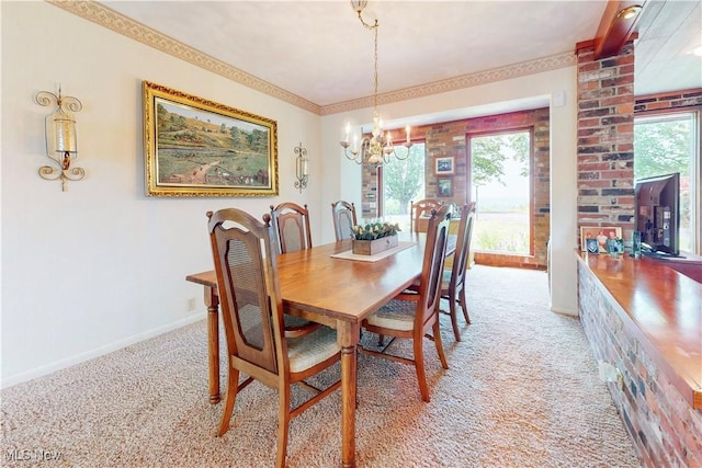 6803 County Road 22a, Bloomingdale, OH 43910 - dining room with light carpet, a chandelier, and ornamental molding
