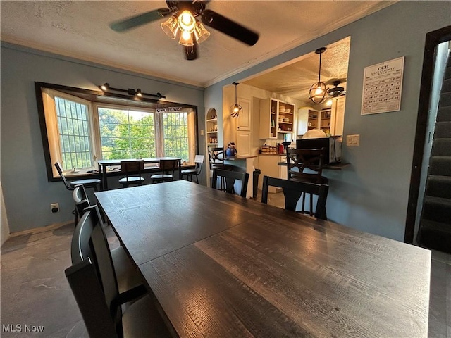 73 High St, Clay, WV 25043 - dining room with crown molding and a ceiling fan