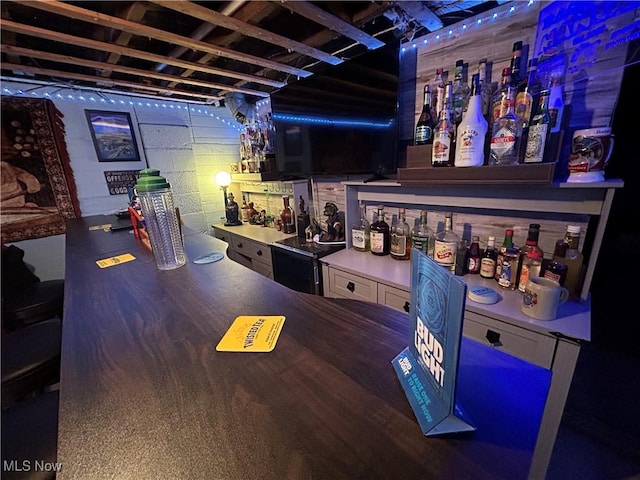73 High St, Clay, WV 25043 - indoor bar featuring concrete block wall and electric range oven