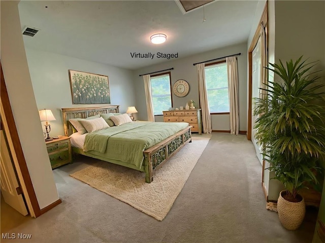 13781 Rustic Dr, North Royalton, OH 44133 - bedroom featuring light colored carpet and attic access