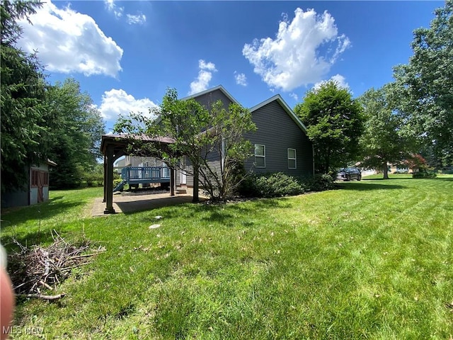13781 Rustic Dr, North Royalton, OH 44133 - view of side of property featuring a gazebo, a lawn, and a wooden deck