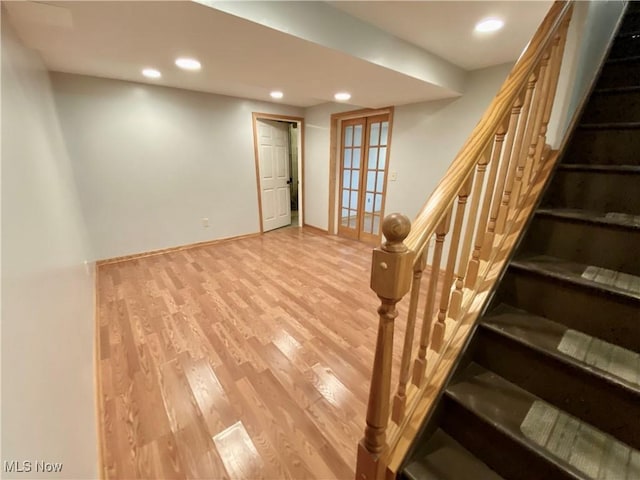 13781 Rustic Dr, North Royalton, OH 44133 - below grade area featuring light wood-style floors, stairs, and recessed lighting