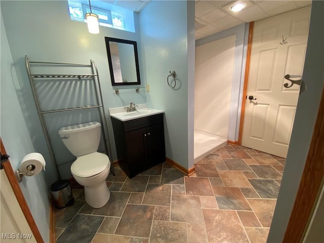 13781 Rustic Dr, North Royalton, OH 44133 - full bathroom featuring vanity, tiled shower, and stone finish floors