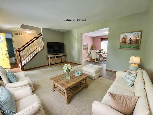 13781 Rustic Dr, North Royalton, OH 44133 - living room with stairway and wood finished floors