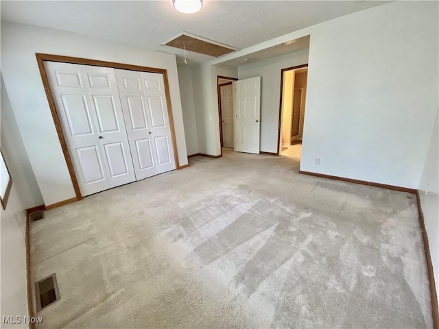 13781 Rustic Dr, North Royalton, OH 44133 - unfurnished bedroom with attic access, carpet floors, and a closet