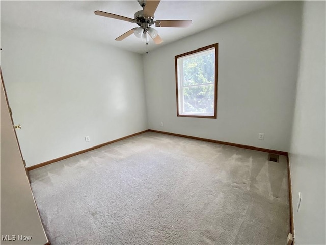 13781 Rustic Dr, North Royalton, OH 44133 - carpeted empty room with baseboards and ceiling fan