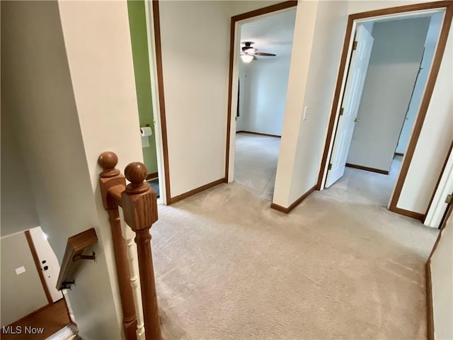 13781 Rustic Dr, North Royalton, OH 44133 - corridor featuring light carpet and baseboards