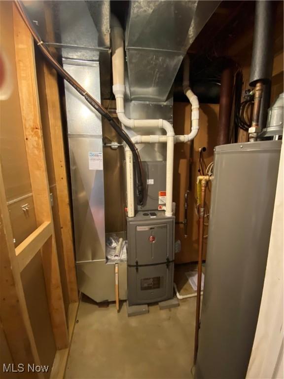 13781 Rustic Dr, North Royalton, OH 44133 - utility room featuring water heater