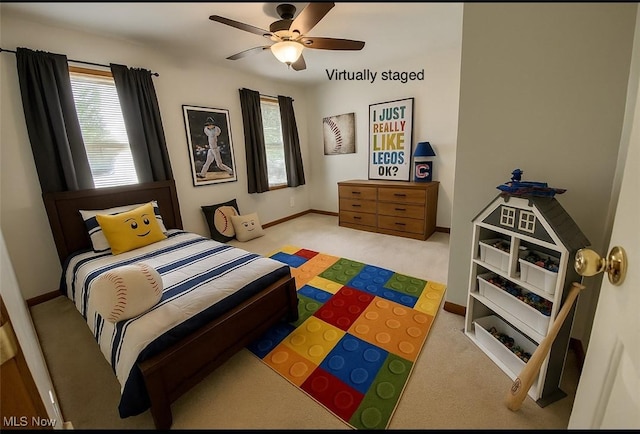 13781 Rustic Dr, North Royalton, OH 44133 - carpeted bedroom with baseboards and ceiling fan