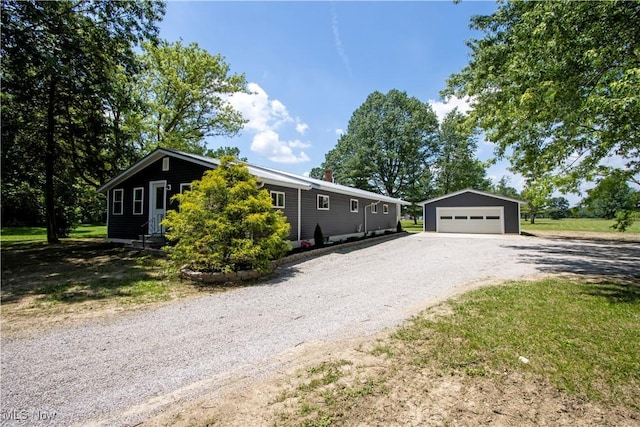 290 State Route 60, Greenwich, OH 44837 - view of front of home featuring an outdoor structure, a garage, and a chimney