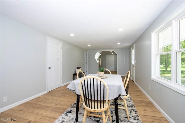 290 State Route 60, Greenwich, OH 44837 - dining space featuring arched walkways, light wood finished floors, and recessed lighting