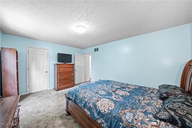 9009 Oak Ct, Windham, OH 44288 - bedroom featuring carpet flooring and a textured ceiling