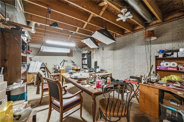 9009 Oak Ct, Windham, OH 44288 - unfinished basement featuring a workshop area