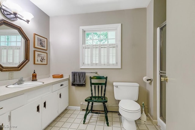 9502 Winchester Vly, Chesterland, OH 44026 - bathroom with a baseboard radiator, plenty of natural light, vanity, and a shower with shower door